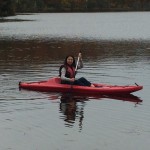 Jessica kayaking at lake in Parc du Mont-Oxford